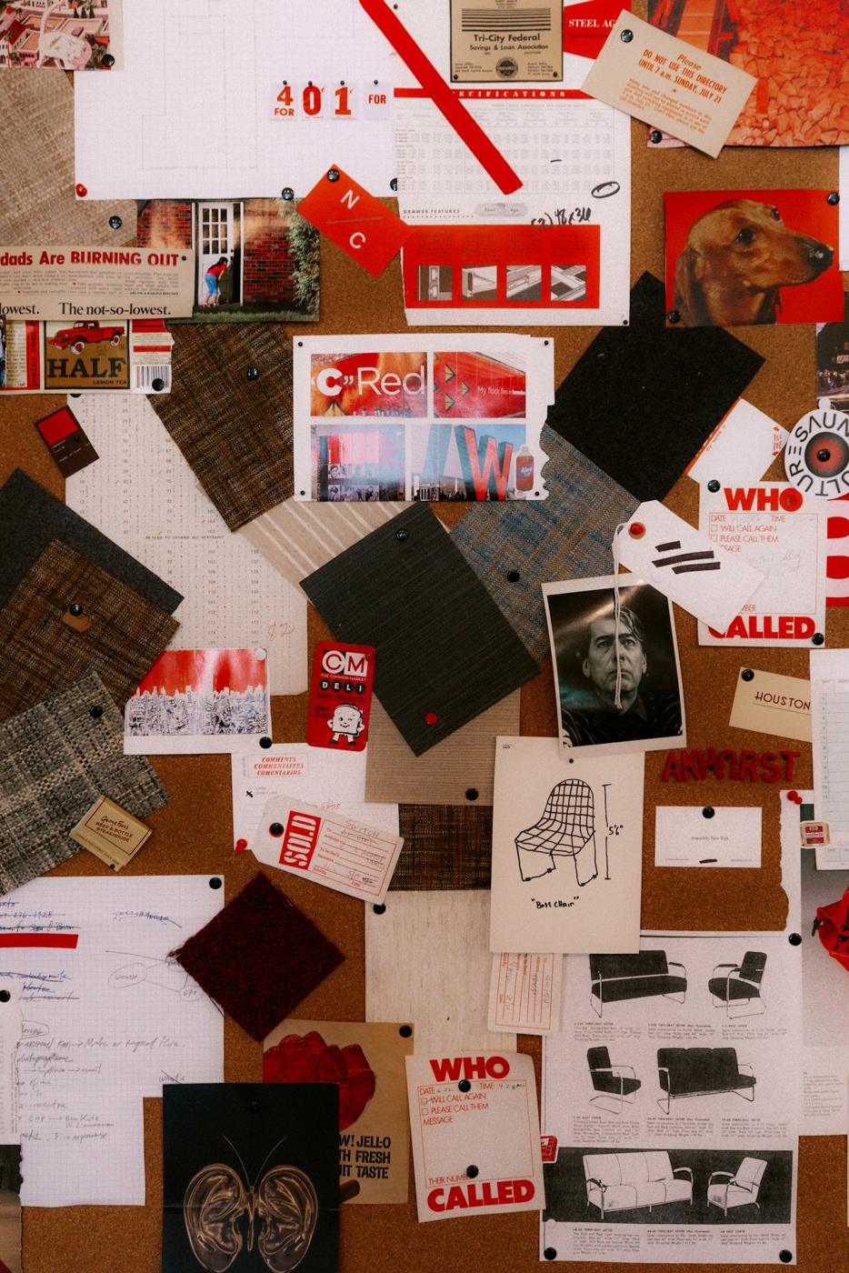 A moodboard of printed references and fabric swatches